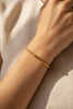 Langley slim closed gold twisted rope bangle on-wrist single wear