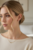 Rylee baby pink resin stud earrings styled with feminine everyday outfit