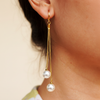 Olivia pearl drop earrings close-up chain and pearl detail