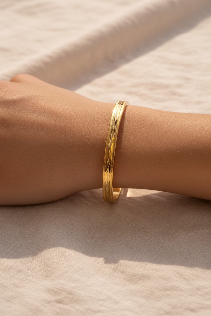 Anaya gold engraved bangle bracelet on-wrist lifestyle