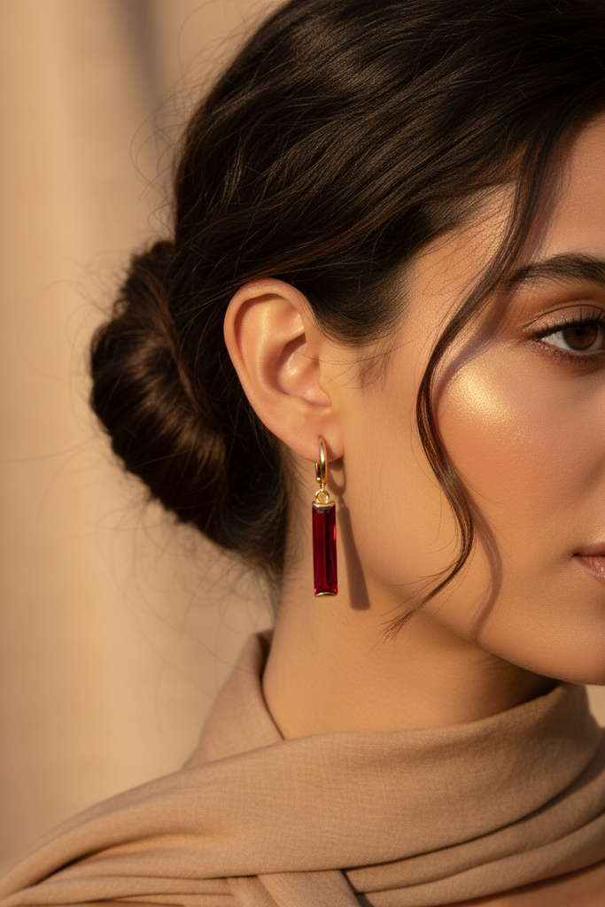 Roisin red resin drop earrings on-ear lifestyle shot