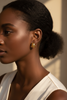 London mini gold filigree hoop earrings worn on ear lifestyle shot