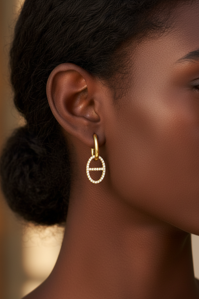 Addison gold diamond drop earrings on-ear lifestyle editorial shot