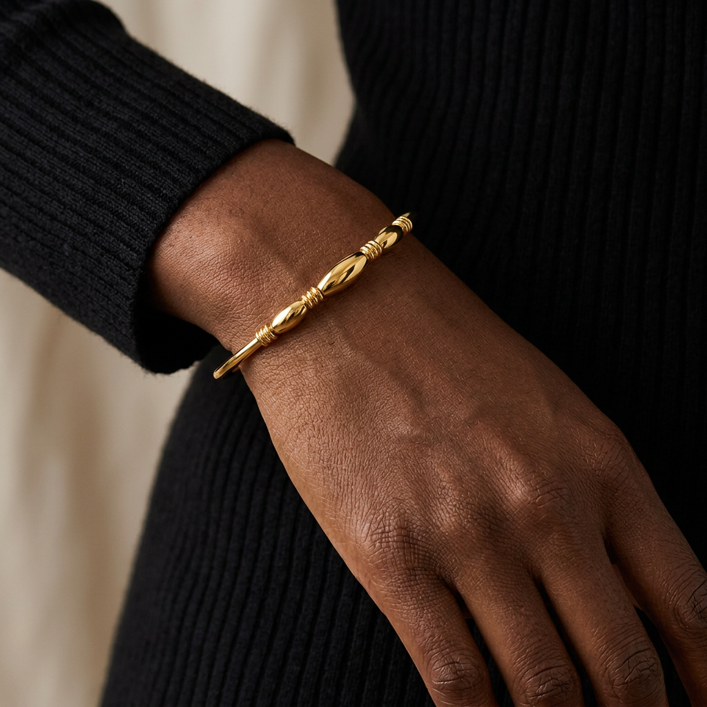 Laurent bangle worn with a black top