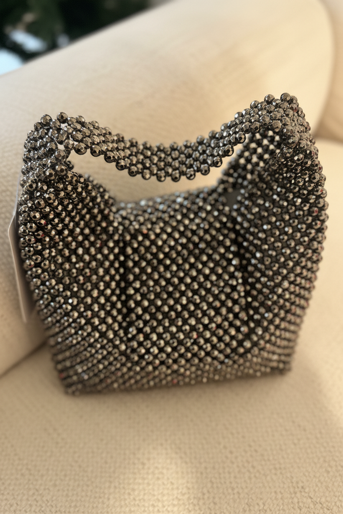 Delores beaded handbag gunmetal close-up faceted bead texture and handle detail