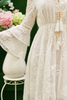Josette Resort Dress - close-up embroidery bell sleeve tassel detail