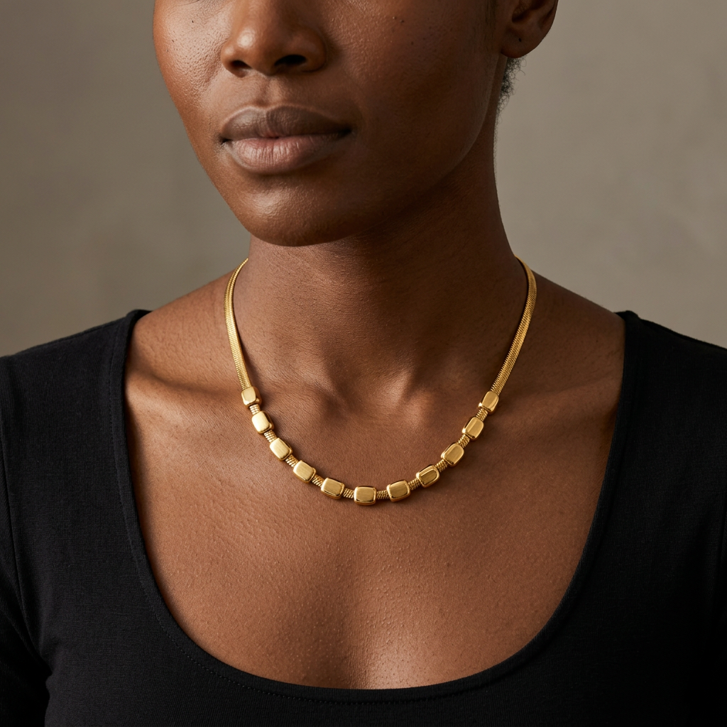 Collette necklace worn with a black top
