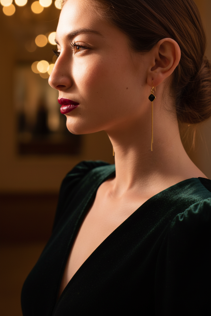 Isabella gold fringe black stone earrings styled with evening outfit