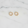 Savannah gold crystal stud earrings flat lay on white marble