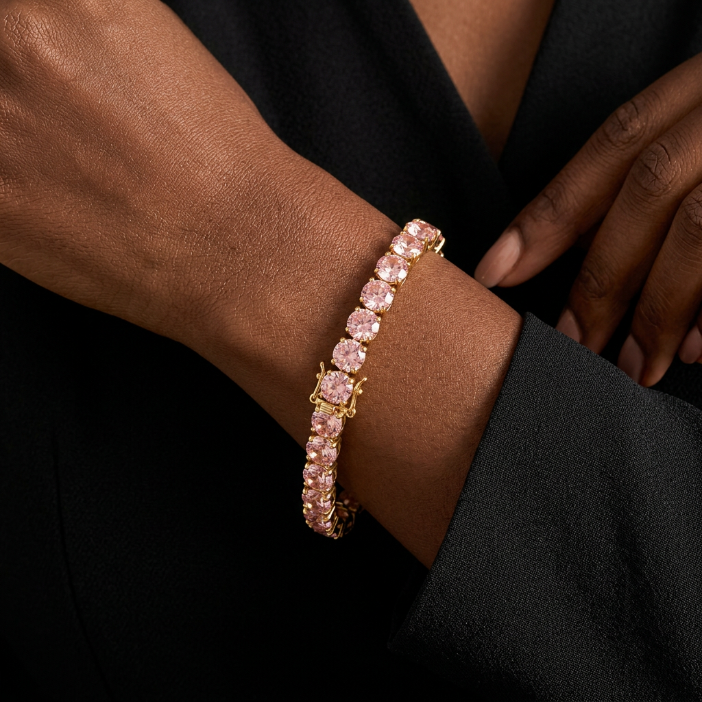 Juliette pink stone tennis bracelet on a model with black evening styling