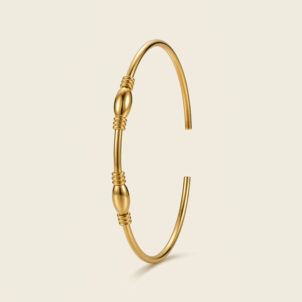 Laurent gold-plated open cuff bangle on ivory