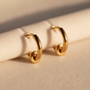 Fionn gold knot hoop earrings close-up knot bead detail